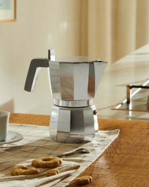 A coffee maker with a familiar and at the same time innovative form. Designed by architect David Chipperfield, Moka is an artist's interpretation of a timeless icon of the Italian culture. Chipperfield introduces a series of details that make the Moka design new and even more functional, such as the flat lid on which to place the cups to be heated - allowing optimum enjoyment of the aroma and flavour of the drink. For those who don't want to compromise on the unmistakeable taste of coffee prepared with an espresso coffee maker.